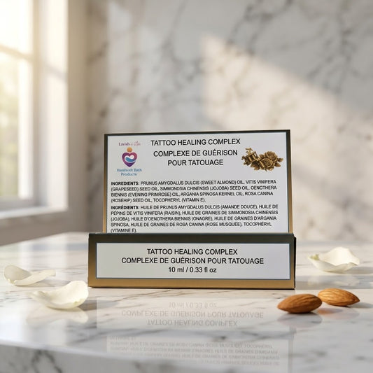 Lavish 4 Less Handmade Bath Products Tattoo Healing Complex box on marble with almonds and petals, highlighting natural tattoo aftercare ingredients.